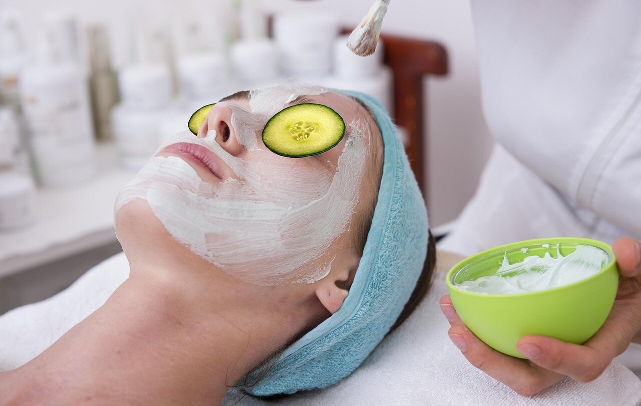 Esthetician performing a facial skincare treatment